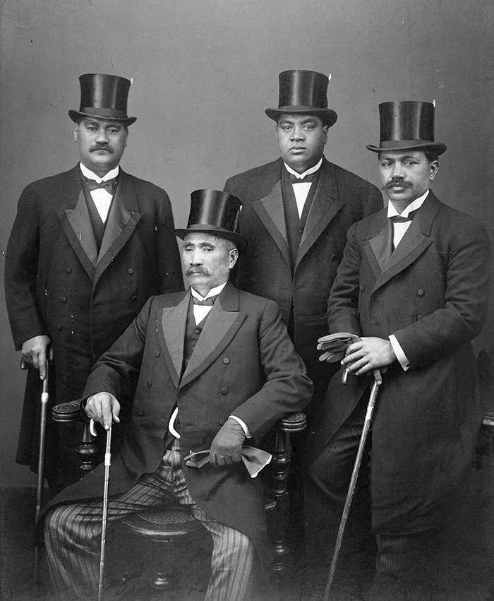'The 1914 mission to England', 1914. Mita Karaka, Tupu Taingakawa (seated), the Māori King Te Rata Mahuta Pōtatau Te Wherowhero, and Hōri Tiro Pāhora travelled to England to meet King George and Queen Mary. PH-CNEG-B8278